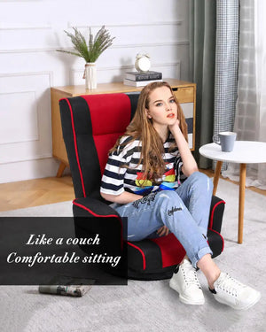 Red 360° swivel floor chair with padded armrests